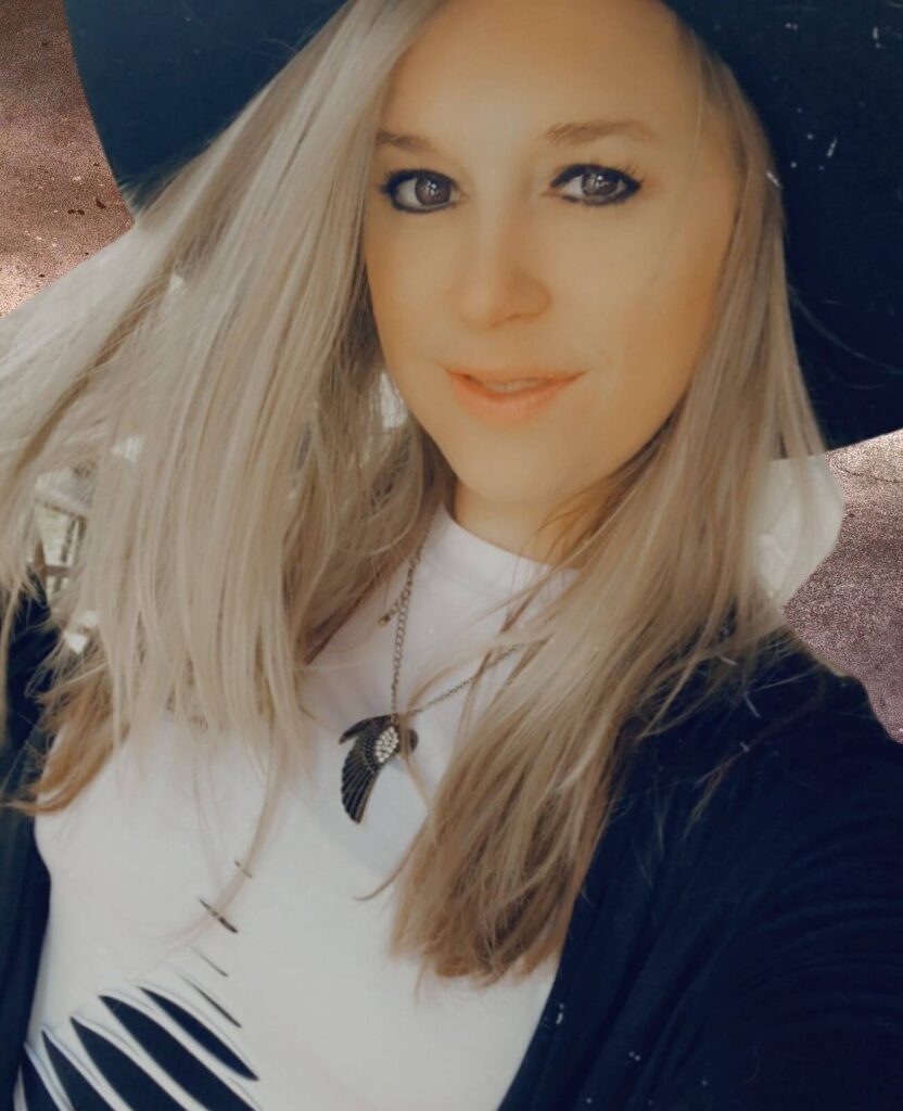 blonde woman in black hat